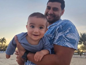 Dr. Garcia holding a baby
